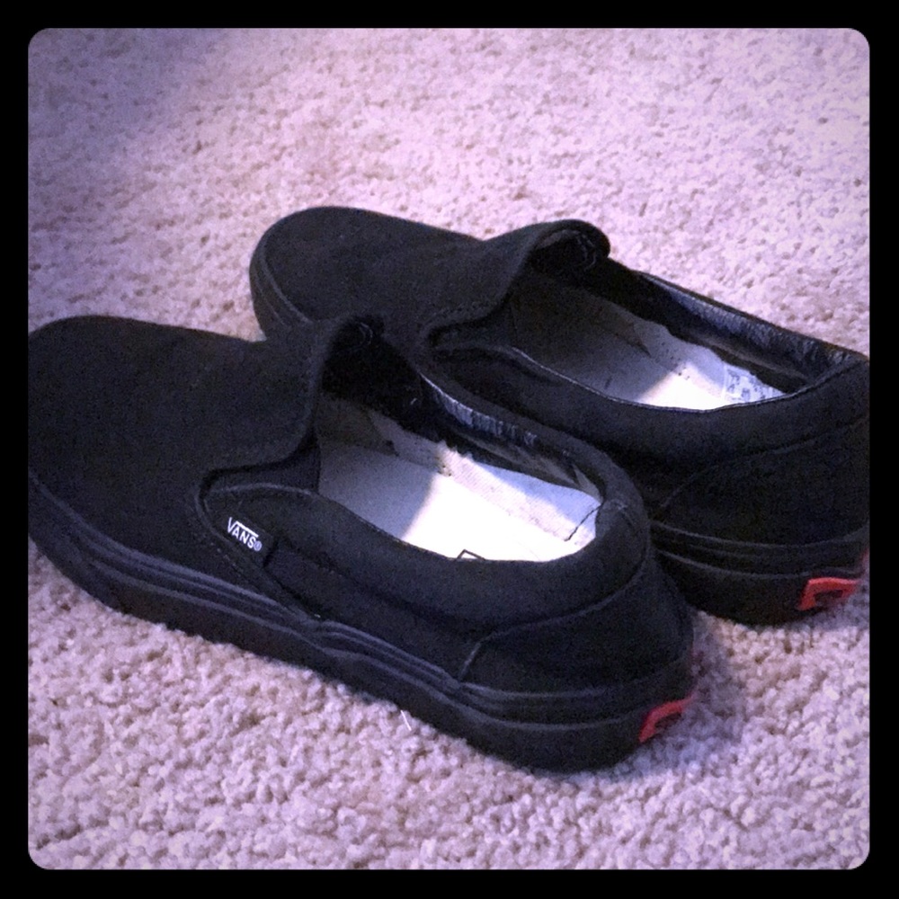 Vans size 9 black slip on